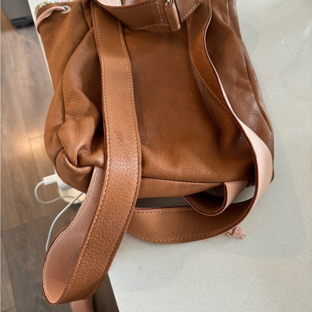 Crazy soft leather  but I would call it pastel on the bag is soft and feminine